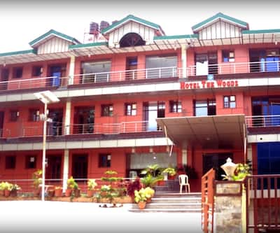 https://imgcld.yatra.com/ytimages/image/upload/t_hotel_yatra_city_desktop/v1444033360/Domestic Hotels/Hotels_Dharamshala/Hotel The Woodz/Overview.jpg